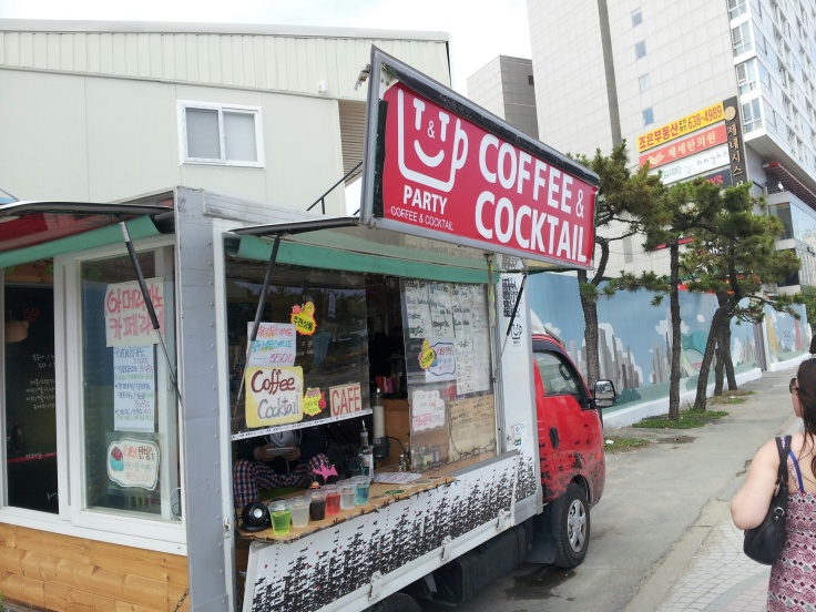 74. T&T Party Coffee & Cocktail (Haeundae, Busan). This cafe on wheels is a prime example of coffee's stranglehold on the populace. Located within walking distance of Korea's most famous beach, Haeundae, this truck sells mostly bagged, alcoholic concoctions (drinking in public is legal in South Korea), meant to be enjoyed by tourists moving from bar to bar back to the beach or their hostel. It's the majority of the menu, but there's also coffee. Which, I suppose works. If this thing is in operation at 4 a.m., it might be nice to get a cuppa to perk you up enough to last until the sunrise.
